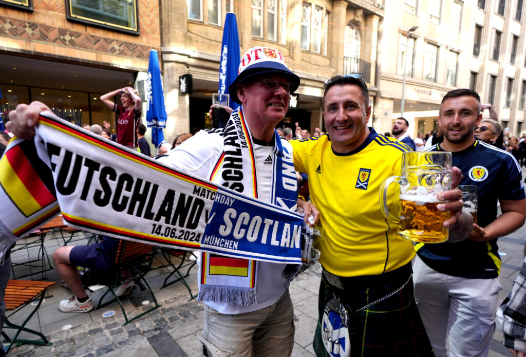 Scotland fans at Marienplatz in Munich, Germany. Scotland will face Germany in the Euro 2024 opener tomorrow. Picture date: Thursday June 13, 2024.,Image: 881386916, License: Rights-managed, Restrictions: Use subject to restrictions. Editorial use only, no commercial use without prior consent from rights holder., Model Release: no, Credit line: Andrew Milligan / PA Images / Forum