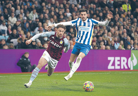 Aston Villa&#039;s Matty Cash (left) and Brighton and Hove Albion&#039;s Jakub Moder (right) battle for the ball during the Premier League match at Villa Park, Birmingham. Picture date: Saturday November 20, 2021.,Image: 644105289, License: Rights-managed, Restrictions: EDITORIAL USE ONLY No use with unauthorised audio, video, data, fixture lists, club/league logos or &quot;live&quot; services. Online in-match use limited to 120 images, no video emulation. No use in betting, games or single club/league/player publications., Model Release: no, Credit line: Bradley Collyer / PA Images / Forum