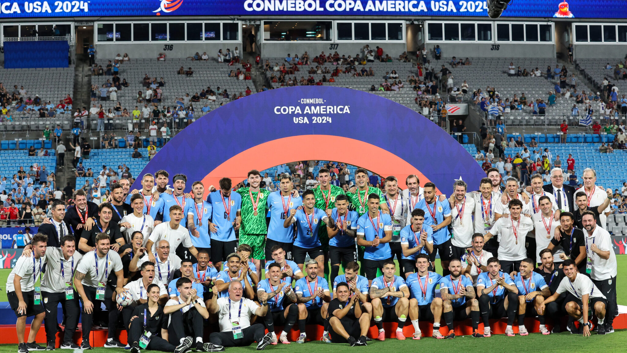 July 13, 2024, Charlotte, North Carolina, U.S: Uruguay teammates and staff pose for a group photo after the award ceremony during the CONMEBOL Copa America match between Uruguay and Canada at Bank of America Stadium in Charlotte, NC on July 13, 2024.,Image: 889590721, License: Rights-managed, Restrictions: , Model Release: no, Credit line: Cory Knowlton / Zuma Press / Forum