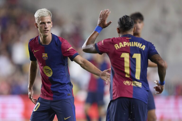 Dani Olmo (FC Barcelona) and Raphinha Dias Belloli (FC Barcelona) celebrate their teammate&#039;s goal during the LaLiga match between Rayo Vallecano and FC Barcelona at Campo de Fútbol de Vallecas on August 27, 2024 in Madrid, Spain.  
LIGA HISZPANSKA PILKA NOZNA SEZON 2024/2025
FOT. DEFODI IMAGES/newspix.pl / 400mm.pl

POLAND ONLY !!
---
newspix.pl / 400mm.pl