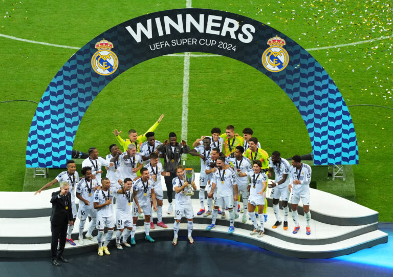 Soccer Football - Super Cup - Real Madrid v Atalanta - National Stadium, Warsaw, Poland - August 14, 2024 Real Madrid&#039;s Luka Modric lifts the trophy as he celebrates with teammates after winning the Super Cup,Image: 898756370, License: Rights-managed, Restrictions: , Model Release: no, Credit line: Aleksandra Szmigiel / Reuters / Forum