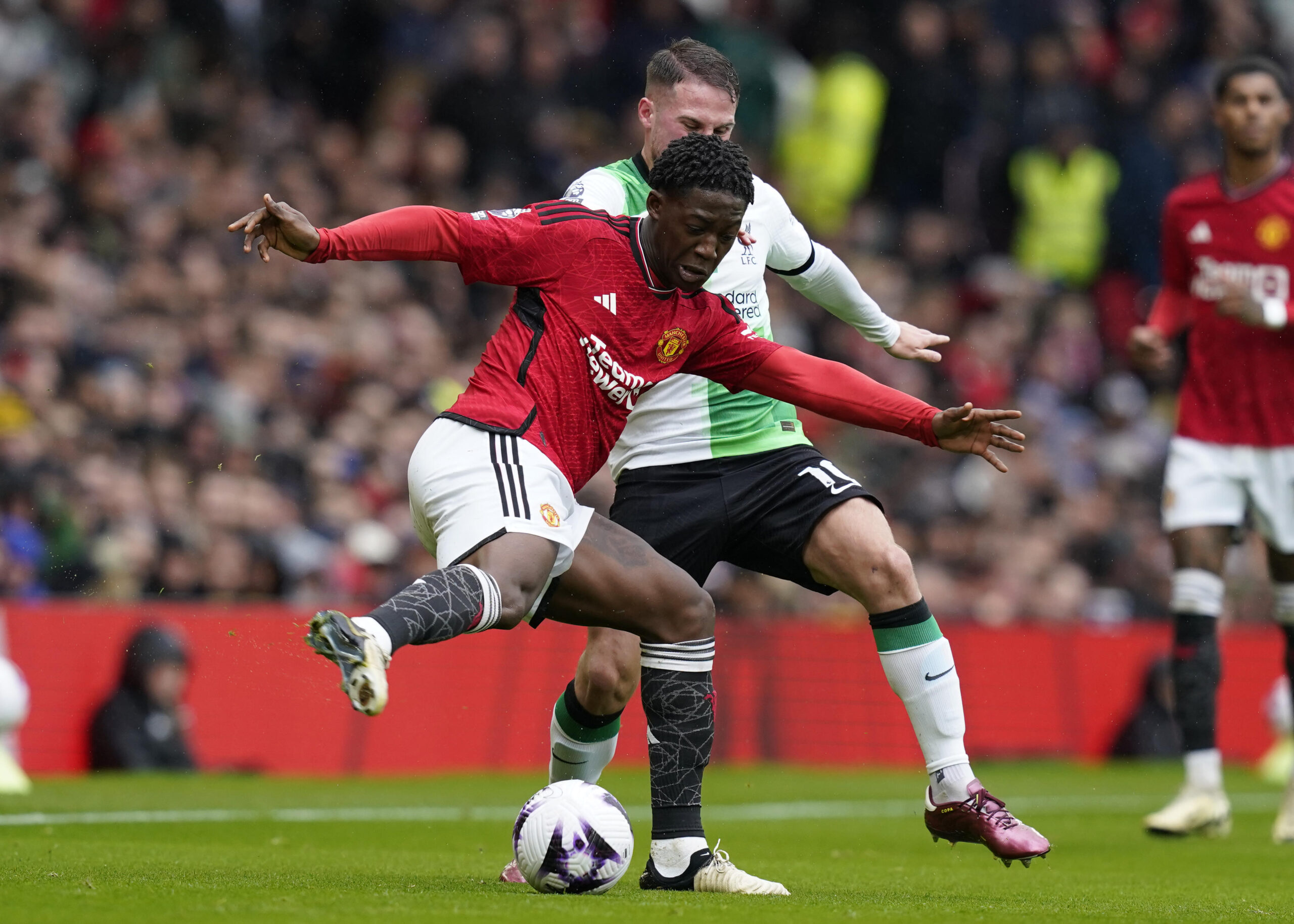 April 7, 2024, Manchester: Manchester, England, 7th April 2024. Kobbie Mainoo of Manchester United tackled by Alexis Mac Allister of Liverpool during the Premier League match at Old Trafford, Manchester. (Credit Image: � Andrew Yates/CSM via ZUMA Press Wire)
LIGA ANGIELSKA PILKA NOZNA SEZON 2023/2024
FOT. ZUMA/newspix.pl / 400mm.pl
POLAND ONLY!
---
newspix.pl / 400mm.pl