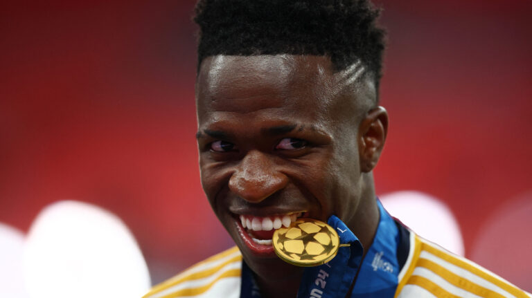 Soccer Football - Champions League - Final - Borussia Dortmund v Real Madrid - Wembley Stadium, London, Britain - June 1, 2024 Real Madrid&#039;s Vinicius Junior poses with his winners medal in his mouth as he celebrates winning the Champions League,Image: 878201805, License: Rights-managed, Restrictions: , Model Release: no, Credit line: Carl Recine / Reuters / Forum