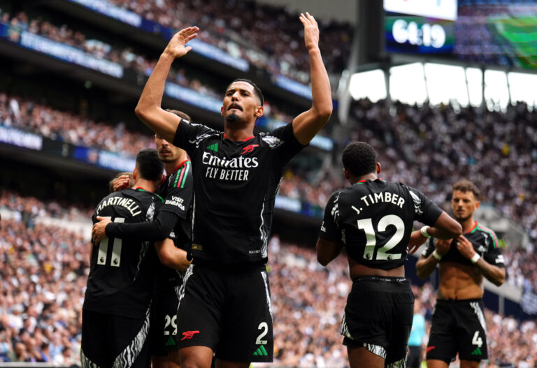 Arsenal&#039;s William Saliba celebrates their side&#039;s first goal of the game during the Premier League match at the Tottenham Hotspur Stadium, London. Picture date: Sunday September 15, 2024.,Image: 907914509, License: Rights-managed, Restrictions: EDITORIAL USE ONLY No use with unauthorised audio, video, data, fixture lists, club/league logos or &quot;live&quot; services. Online in-match use limited to 120 images, no video emulation. No use in betting, games or single club/league/player publications., Model Release: no, Credit line: John Walton / PA Images / Forum