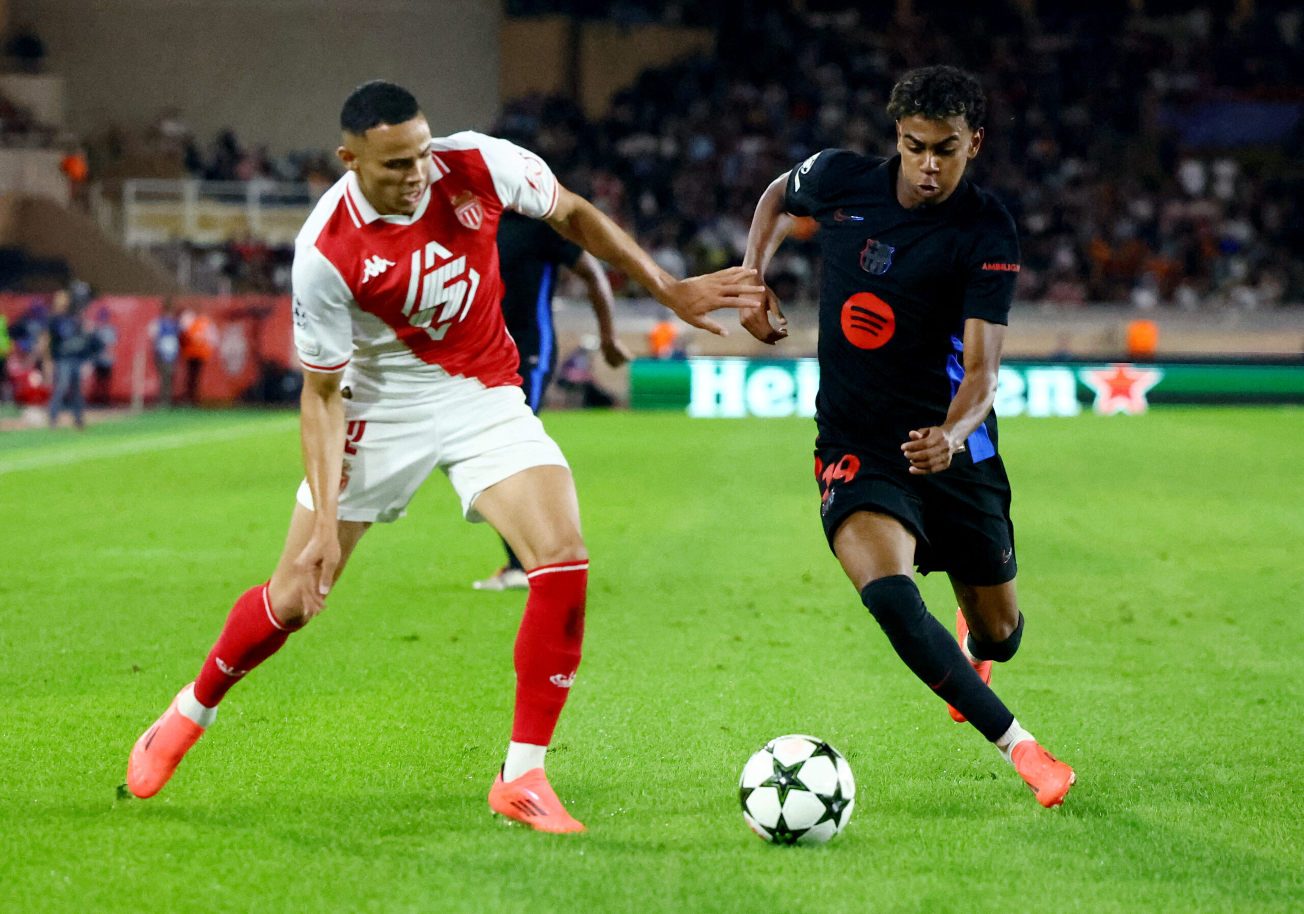 Soccer Football - Champions League - AS Monaco v FC Barcelona - Stade Louis II, Monaco - September 19, 2024 AS Monaco&#039;s Vanderson in action with FC Barcelona&#039;s Lamine Yamal,Image: 909865062, License: Rights-managed, Restrictions: , Model Release: no, Credit line: Manon Cruz / Reuters / Forum