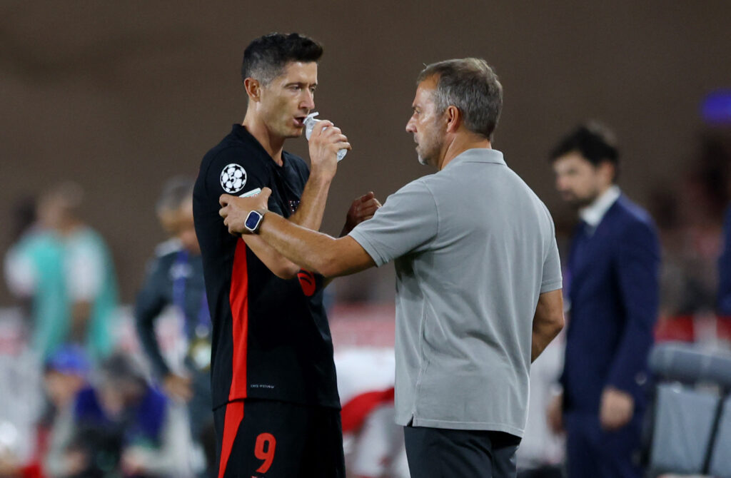 Soccer Football - Champions League - AS Monaco v FC Barcelona - Stade Louis II, Monaco - September 19, 2024 FC Barcelona coach Hansi Flick with Robert Lewandowski,Image: 909875372, License: Rights-managed, Restrictions: , Model Release: no, Credit line: Manon Cruz / Reuters / Forum