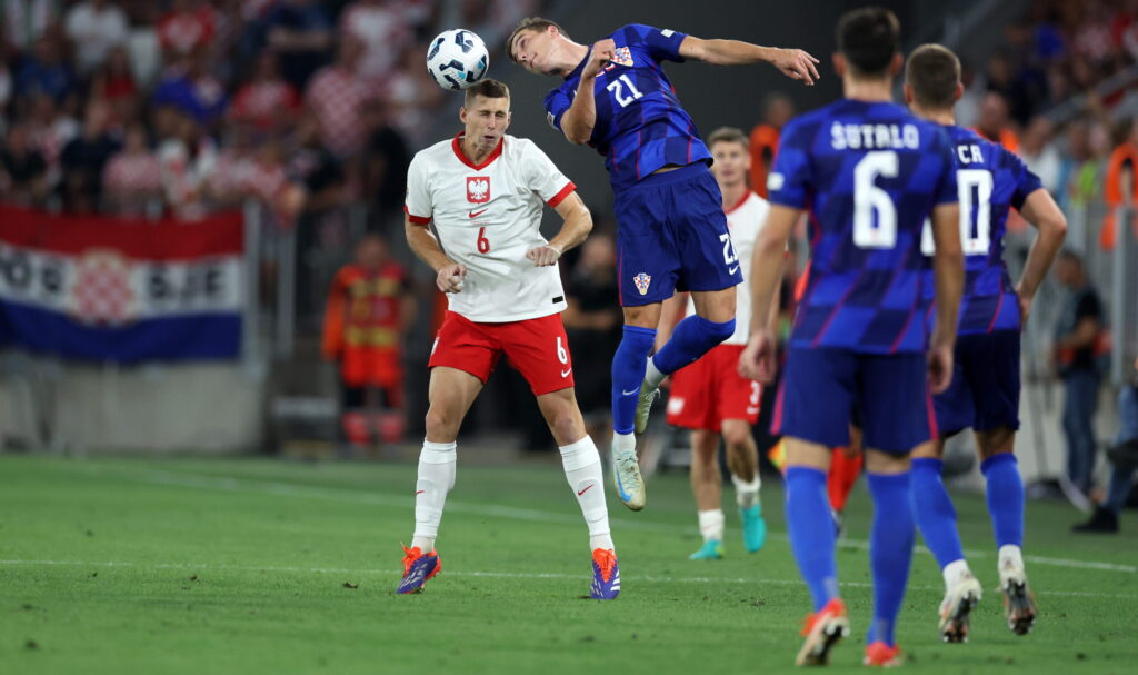 OSIJEK 08.09.2024
MECZ 2. KOLEJKA GRUPA A1 LIGA NARODOW SEZON 2024/25: CHORWACJA - POLSKA 1:0 --- UEFA NATIONS LEAGUE FOOTBALL MATCH: CROATIA - POLAND 1:0
JAKUB PIOTROWSKI  LUKA SUCIC
FOT. PIOTR KUCZA/400mm.pl