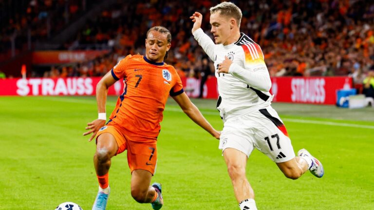 Florian Wirtz of Germany dribbles with the ball, defends by Xavi Simons of Netherlands during the UEFA Nations League 2024/2025 League A - Group 3 match between Netherlands and Germany at Johan Cruijff ArenA on September 10, 2024 in Amsterdam, Netherlands.  (Photo by Marcel ter Bals/DeFodi Images)  
LIGA NARODOW UEFA PILKA NOZNA SEZON 2024/2025
HOLANDIA v NIEMCY
FOT. DEFODI IMAGES/newspix.pl / 400mm.pl

POLAND ONLY !!
---
newspix.pl / 400mm.pl