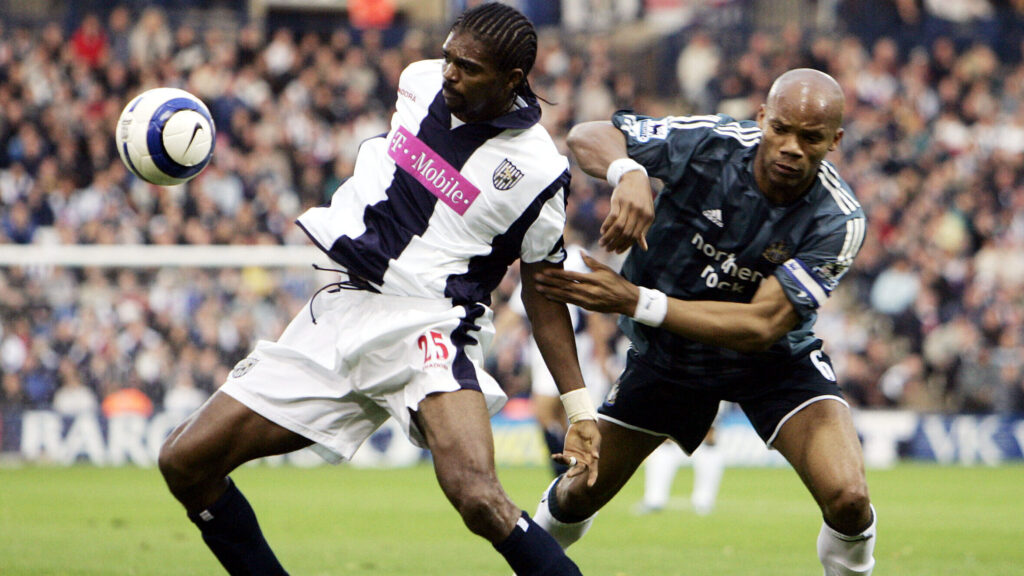 Football - West Bromwich Albion v Newcastle United FA Barclays Premiership  - The Hawthorns - 30/10/05 
West Brom&#039;s Nwankwo Kanu and Newcastle&#039;s Jean Alain Boumsong in action 
 / Alex Morton 
Livepic 
NO ONLINE/INTERNET USE WITHOUT A LICENCE FROM THE FOOTBALL DATA CO LTD.,Image: 449814011, License: Rights-managed, Restrictions: 01, Model Release: no, Credit line: AI Project / Reuters / Forum