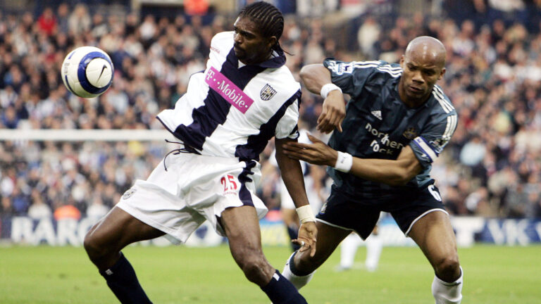 Football - West Bromwich Albion v Newcastle United FA Barclays Premiership  - The Hawthorns - 30/10/05 
West Brom&#039;s Nwankwo Kanu and Newcastle&#039;s Jean Alain Boumsong in action 
 / Alex Morton 
Livepic 
NO ONLINE/INTERNET USE WITHOUT A LICENCE FROM THE FOOTBALL DATA CO LTD.,Image: 449814011, License: Rights-managed, Restrictions: 01, Model Release: no, Credit line: AI Project / Reuters / Forum