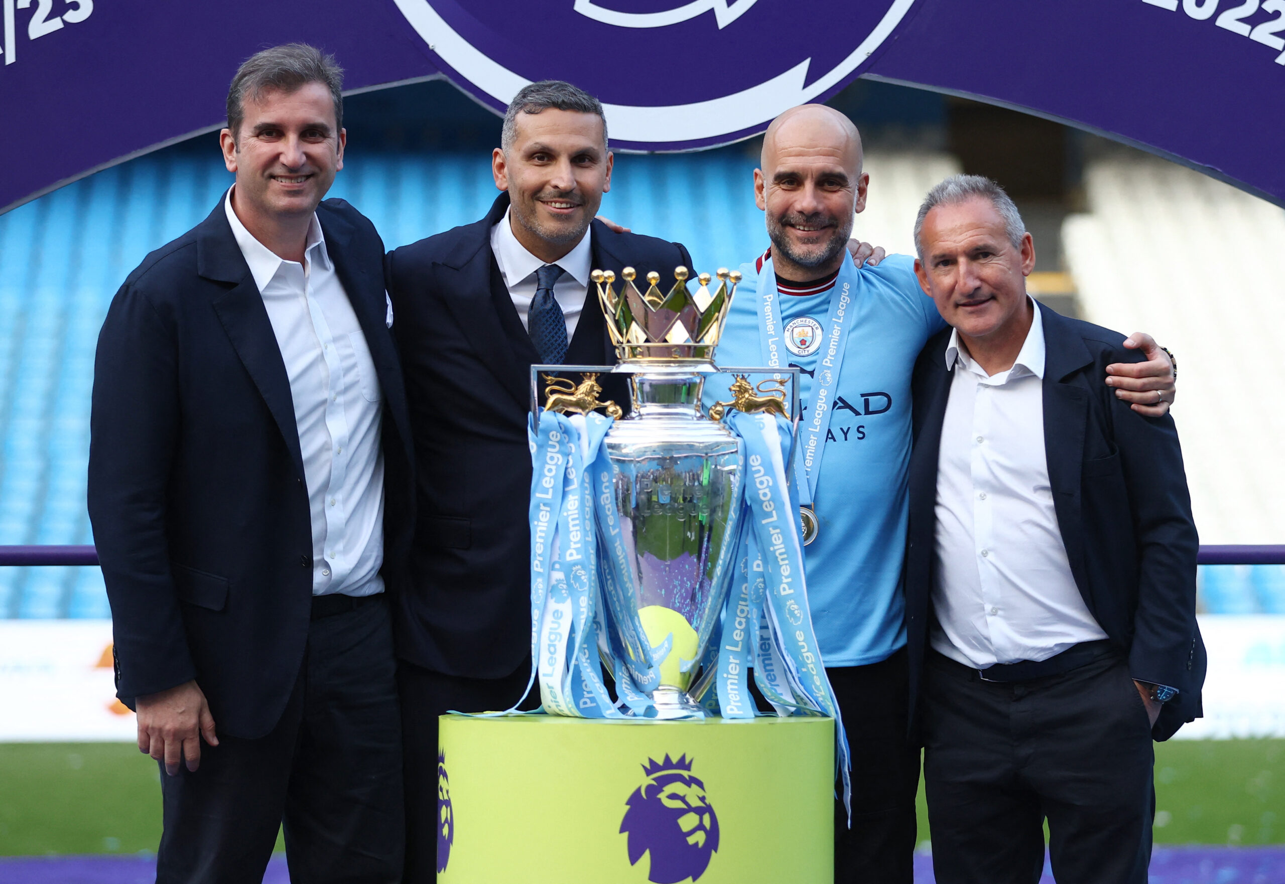 Soccer Football - Premier League - Manchester City v Chelsea - Etihad Stadium, Manchester, Britain - May 21, 2023 Manchester City CEO Ferran Soriano, chairman Khaldoon Al Mubarak, manager Pep Guardiola and director of football Txiki Begiristain pose with the trophy after winning the Premier League  EDITORIAL USE ONLY. No use with unauthorized audio, video, data, fixture lists, club/league logos or &#039;live&#039; services. Online in-match use limited to 75 images, no video emulation. No use in betting, games or single club /league/player publications.  Please contact your account representative for further details.,Image: 778010924, License: Rights-managed, Restrictions: NO USE WITH UNAUTHORIZED AUDIO, VIDEO, DATA, FIXTURE LISTS, CLUB/LEAGUE LOGOS OR “LIVE” SERVICES. ONLINE IN-MATCH USE LIMITED TO 45 IMAGES, NO VIDEO EMULATION. NO USE IN BETTING, GAMES OR SINGLE CLUB/LEAGUE/PLAYER PUBLICATIONS., Model Release: no, Credit line: CARL RECINE / Reuters / Forum