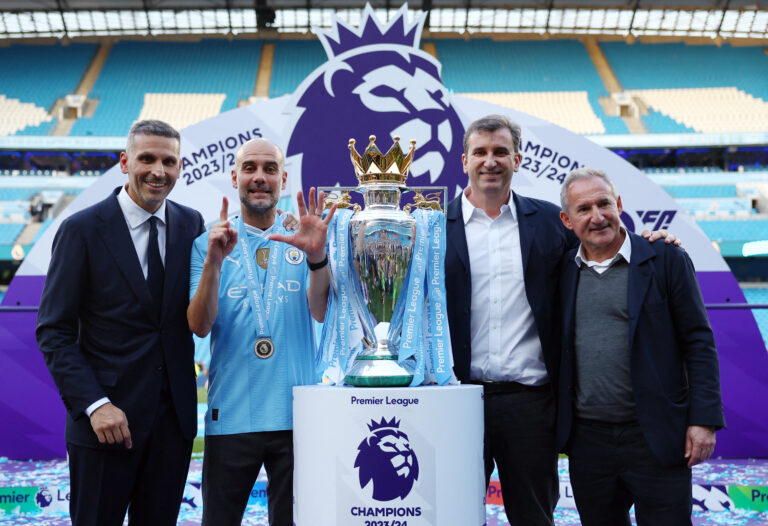 Soccer Football - Premier League - Manchester City v West Ham United - Etihad Stadium, Manchester, Britain - May 19, 2024  Manchester City manager Pep Guardiola with chairman Khaldoon Al Mubarak, chief executive Ferran Soriano and director of football Txiki Begiristain celebrate with the trophy after winning the Premier League  EDITORIAL USE ONLY. NO USE WITH UNAUTHORIZED AUDIO, VIDEO, DATA, FIXTURE LISTS, CLUB/LEAGUE LOGOS OR &#039;LIVE&#039; SERVICES. ONLINE IN-MATCH USE LIMITED TO 120 IMAGES, NO VIDEO EMULATION. NO USE IN BETTING, GAMES OR SINGLE CLUB/LEAGUE/PLAYER PUBLICATIONS. PLEASE CONTACT YOUR ACCOUNT REPRESENTATIVE FOR FURTHER DETAILS..,Image: 874558105, License: Rights-managed, Restrictions: NO USE WITH UNAUTHORIZED AUDIO, VIDEO, DATA, FIXTURE LISTS, CLUB/LEAGUE LOGOS OR “LIVE” SERVICES. ONLINE IN-MATCH USE LIMITED TO 45 IMAGES, NO VIDEO EMULATION. NO USE IN BETTING, GAMES OR SINGLE CLUB/LEAGUE/PLAYER PUBLICATIONS., Model Release: no, Credit line: Molly Darlington / Reuters / Forum