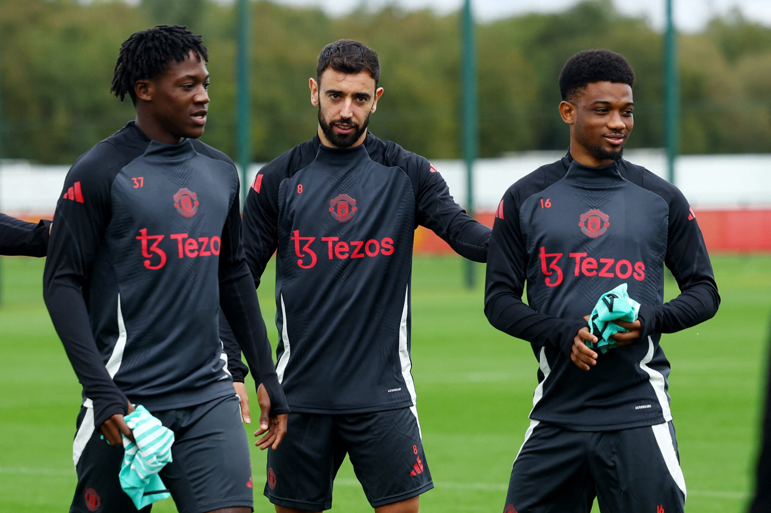 Soccer Football - Europa League - Manchester United Training - Trafford Training Centre, Carrington, Britain - September 24, 2024 Manchester United&#039;s Kobbie Mainoo, Manchester United&#039;s Bruno Fernandes and Manchester United&#039;s Amad Diallo during training,Image: 911414254, License: Rights-managed, Restrictions: , Model Release: no, Credit line: Molly Darlington / Reuters / Forum