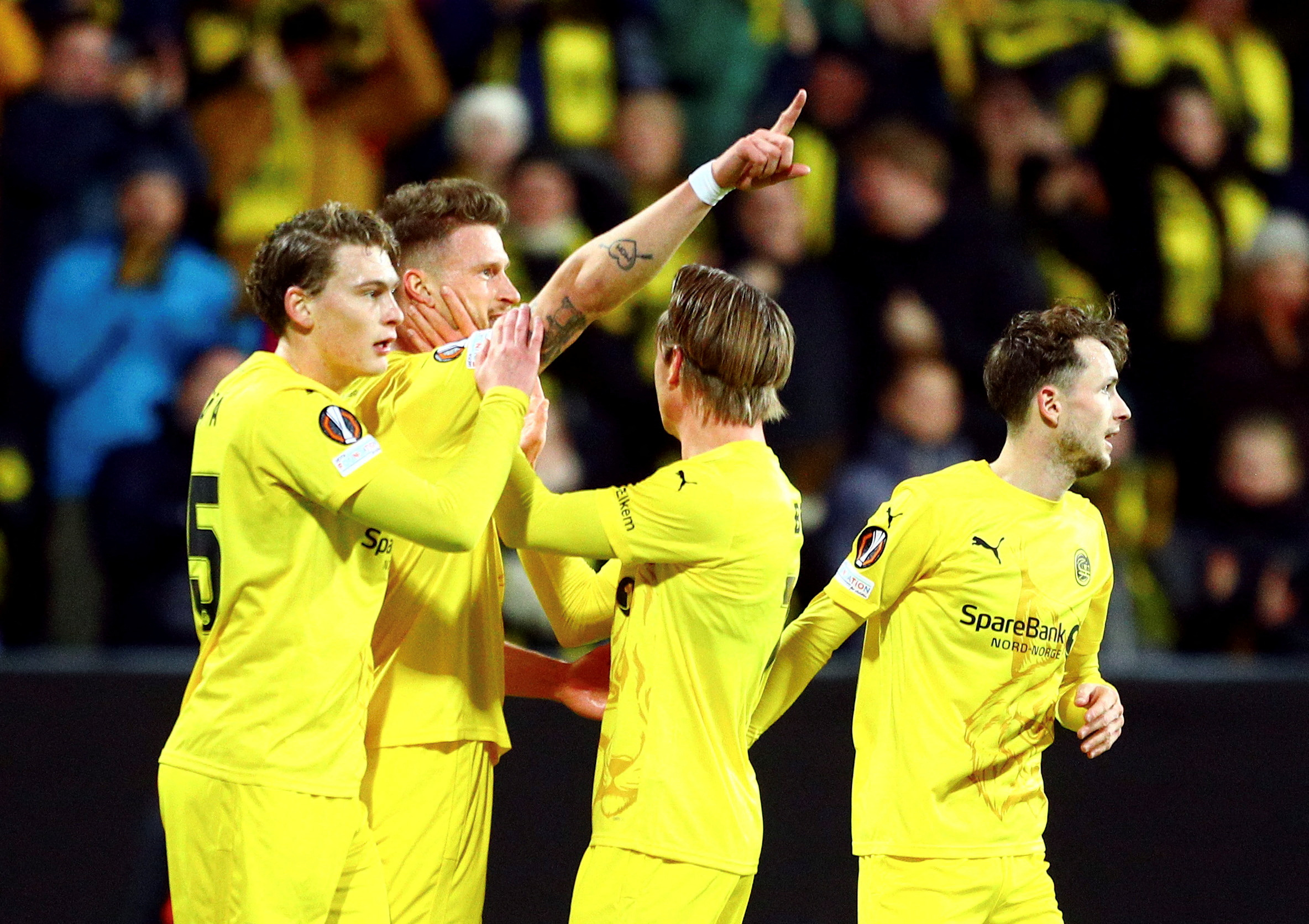 Soccer Football - Europa League - Bodo/Glimt v FC Porto - Aspmyra Stadion, Bodo, Norway - September 25, 2024 Glimt&#039;s Kasper Hogh celebrates scoring their first goal with teammates Mats Torbergsen,Image: 911799542, License: Rights-managed, Restrictions: NORWAY OUT. NO COMMERCIAL OR EDITORIAL SALES IN NORWAY 
THIS IMAGE WAS PROVIDED BY A THIRD PARTY., Model Release: no, Credit line: NTB / Reuters / Forum