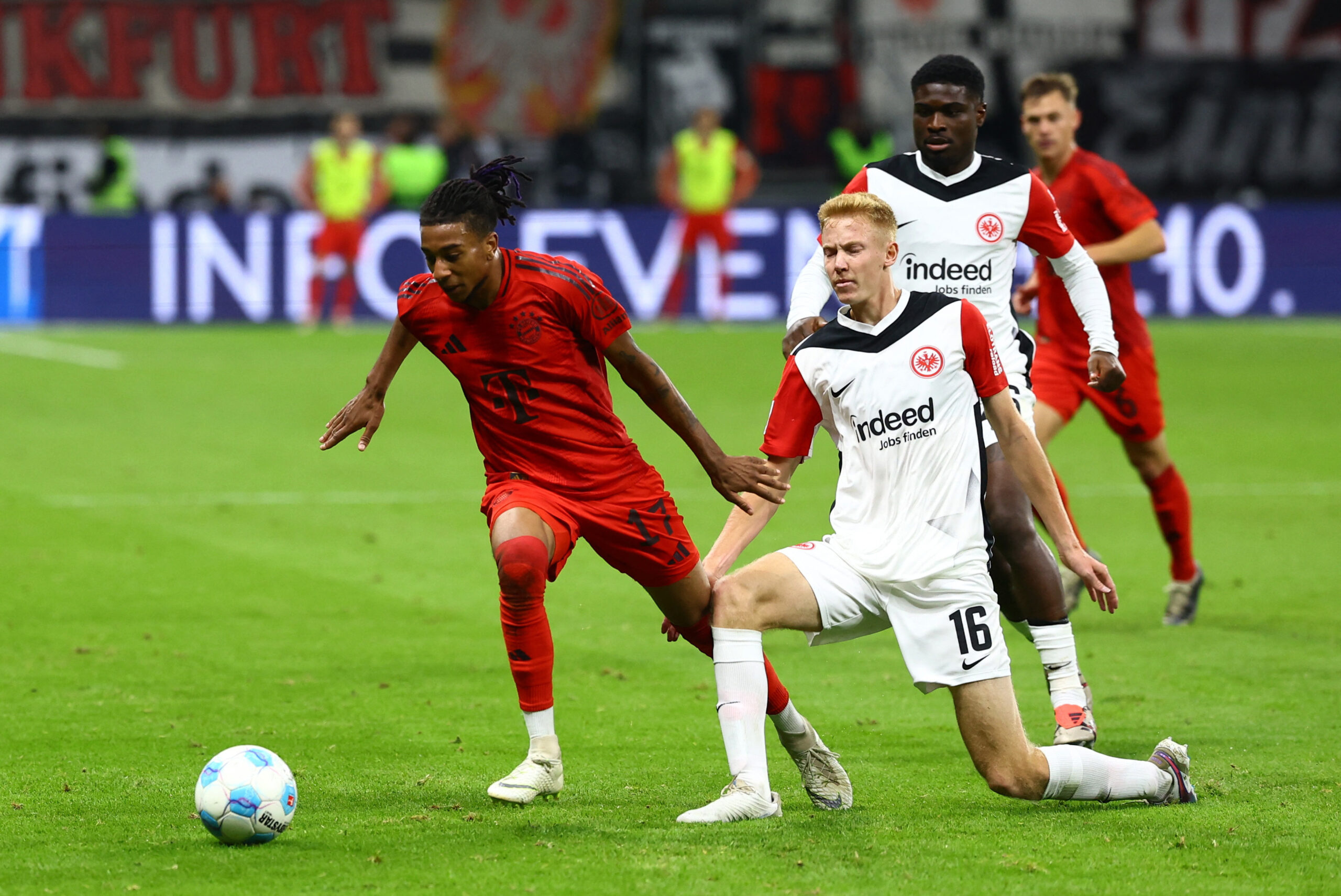 Soccer Football - Bundesliga - Eintracht Frankfurt v Bayern Munich - Deutsche Bank Park, Frankfurt, Germany - October 6, 2024  Bayern Munich&#039;s Michael Olise in action with Eintracht Frankfurt&#039;s Hugo Larsson  DFL REGULATIONS PROHIBIT ANY USE OF PHOTOGRAPHS AS IMAGE SEQUENCES AND/OR QUASI-VIDEO.,Image: 917280476, License: Rights-managed, Restrictions: DFL RULES TO LIMIT THE ONLINE USAGE DURING MATCH TIME TO 15 PICTURES PER GAME. IMAGE SEQUENCES TO SIMULATE VIDEO IS NOT ALLOWED AT ANY TIME. FOR FURTHER QUERIES PLEASE CONTACT DFL DIRECTLY AT + 49 69 650050, Model Release: no, Credit line: Kai Pfaffenbach / Reuters / Forum