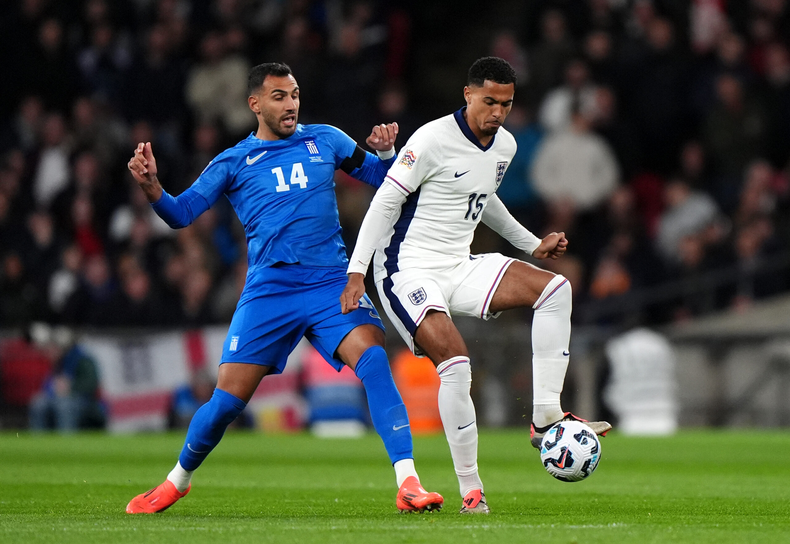 Greece&#039;s Evangelos Pavlidis (left) and England&#039;s Levi Colwill battle for the ball during the UEFA Nations League Group B2 match at Wembley Stadium, London. Picture date: Thursday October 10, 2024.,Image: 919198399, License: Rights-managed, Restrictions: Use subject to FA restrictions. Editorial use only. Commercial use only with prior written consent of the FA. No editing except cropping., Model Release: no, Credit line: Bradley Collyer / PA Images / Forum