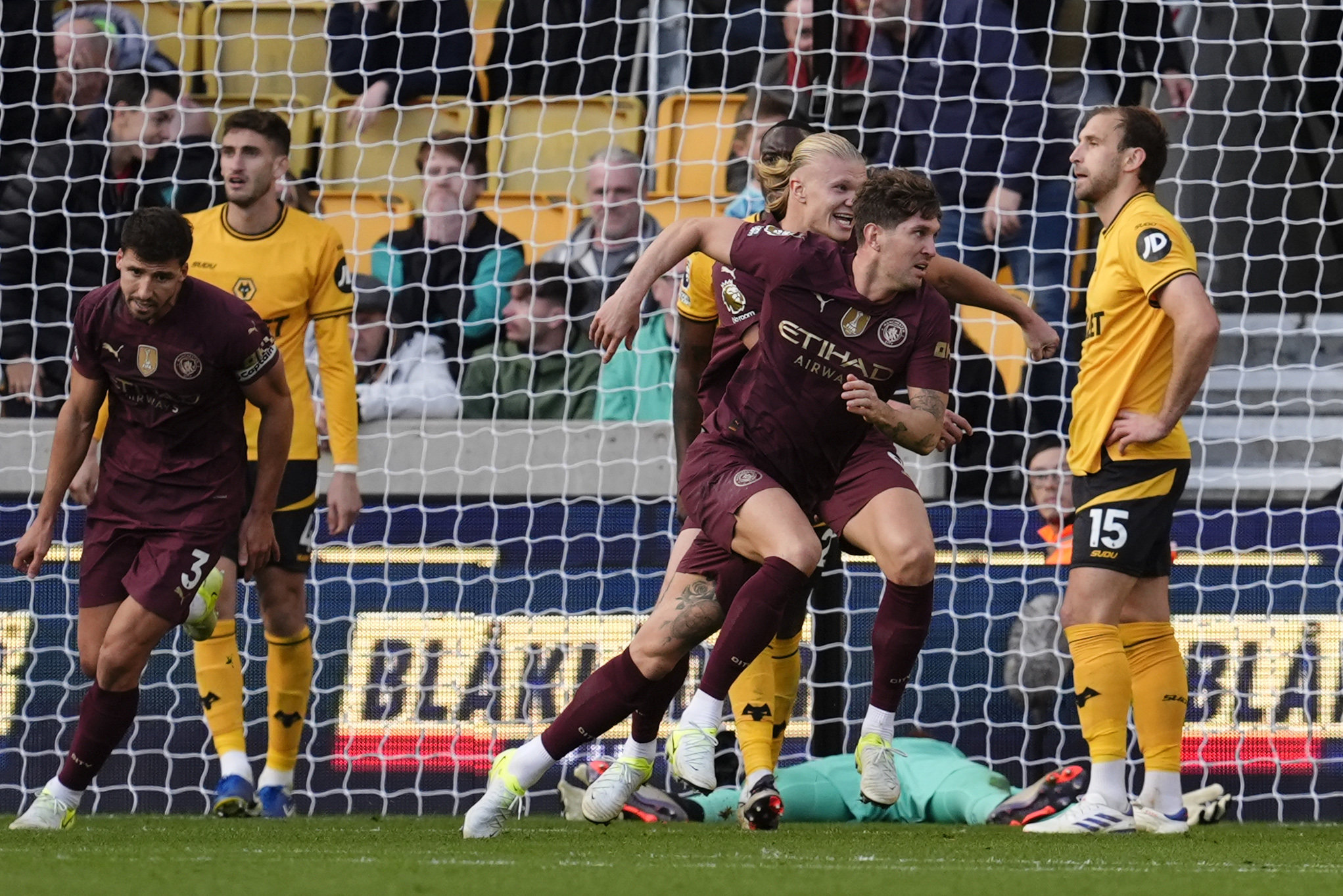 Manchester City&#039;s John Stones (centre, right) celebrates scoring their side&#039;s second goal of the game during the Premier League match at Molineux Stadium, Wolverhampton. Picture date: Sunday October 20, 2024.,Image: 923970048, License: Rights-managed, Restrictions: EDITORIAL USE ONLY No use with unauthorised audio, video, data, fixture lists, club/league logos or &quot;live&quot; services. Online in-match use limited to 120 images, no video emulation. No use in betting, games or single club/league/player publications., Model Release: no, Credit line: Nick Potts / PA Images / Forum