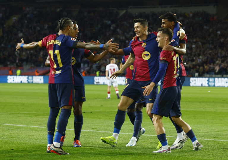 Soccer Football - LaLiga - FC Barcelona v Sevilla - Estadi Olimpic Lluis Companys, Barcelona, Spain - October 20, 2024 FC Barcelona&#039;s Robert Lewandowski celebrates scoring their first goal with teammates,Image: 924059583, License: Rights-managed, Restrictions: , Model Release: no, Credit line: Albert Gea / Reuters / Forum