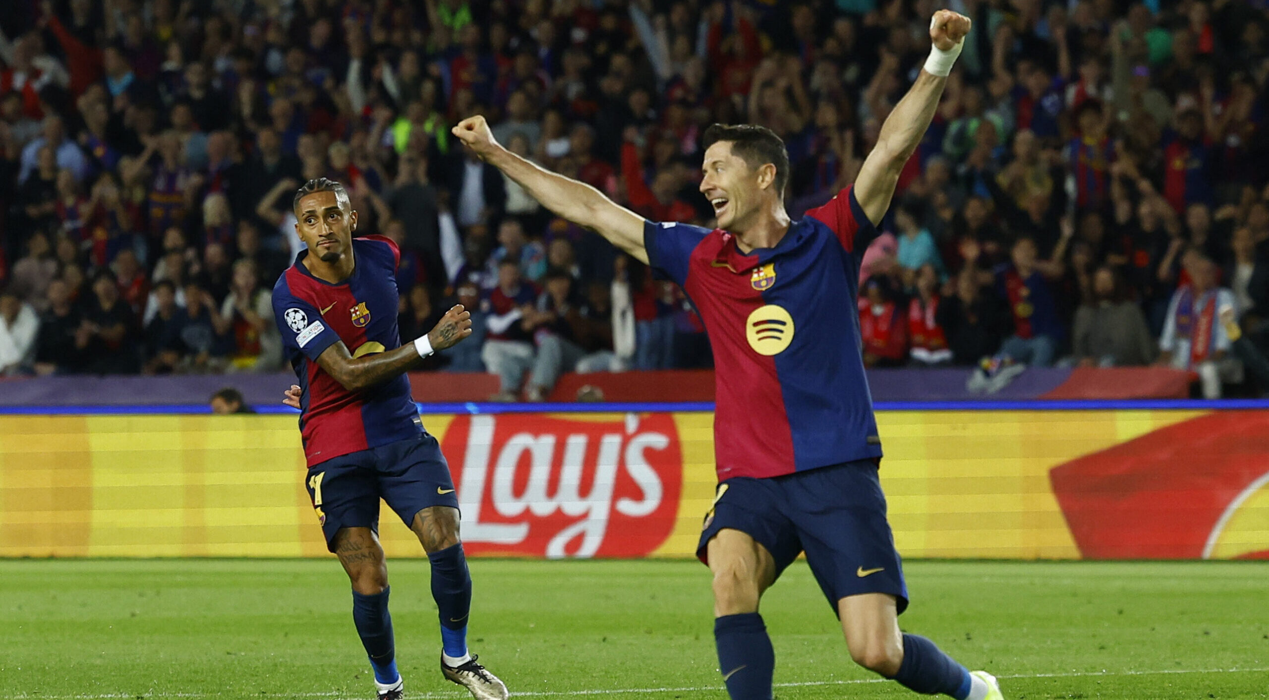 Soccer Football - Champions League - FC Barcelona v Bayern Munich - Estadi Olimpic Lluis Companys, Barcelona, Spain - October 23, 2024 FC Barcelona&#039;s Raphinha celebrates scoring their third goal with Robert Lewandowski,Image: 925502978, License: Rights-managed, Restrictions: , Model Release: no, Credit line: Albert Gea / Reuters / Forum