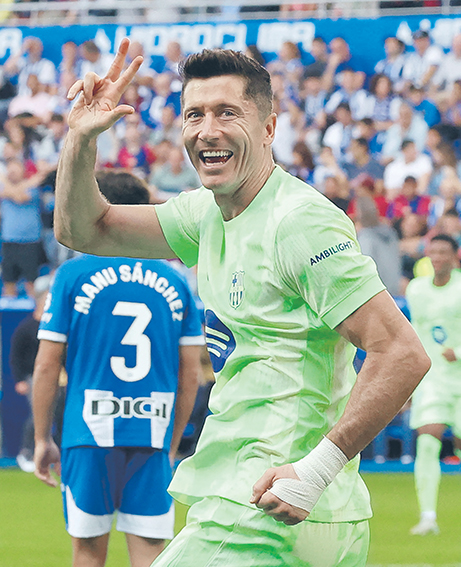 Soccer Football - LaLiga - Deportivo Alaves v FC Barcelona - Estadio Mendizorroza, Vitoria-Gasteiz, Spain - October 6, 2024 FC Barcelona&#039;s Robert Lewandowski celebrates scoring their third goal to complete his hat-trick   REFILE - CORRECTING CAPTION,Image: 917240613, License: Rights-managed, Restrictions: , Model Release: no, Credit line: Vincent West / Reuters / Forum