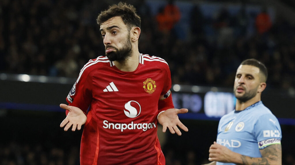 Soccer Football - Premier League - Manchester City v Manchester United - Etihad Stadium, Manchester, Britain - December 15, 2024 Manchester United&#039;s Bruno Fernandes celebrates scoring their first goal  EDITORIAL USE ONLY. NO USE WITH UNAUTHORIZED AUDIO, VIDEO, DATA, FIXTURE LISTS, CLUB/LEAGUE LOGOS OR &#039;LIVE&#039; SERVICES. ONLINE IN-MATCH USE LIMITED TO 120 IMAGES, NO VIDEO EMULATION. NO USE IN BETTING, GAMES OR SINGLE CLUB/LEAGUE/PLAYER PUBLICATIONS. PLEASE CONTACT YOUR ACCOUNT REPRESENTATIVE FOR FURTHER DETAILS..,Image: 947038571, License: Rights-managed, Restrictions: NO USE WITH UNAUTHORIZED AUDIO, VIDEO, DATA, FIXTURE LISTS, CLUB/LEAGUE LOGOS OR “LIVE” SERVICES. ONLINE IN-MATCH USE LIMITED TO 45 IMAGES, NO VIDEO EMULATION. NO USE IN BETTING, GAMES OR SINGLE CLUB/LEAGUE/PLAYER PUBLICATIONS., Model Release: no, Credit line: Jason Cairnduff / Reuters / Forum