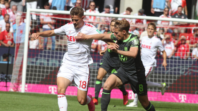 Nicolas Cozza of VfL Wolfsburg (R) and Cologne&#039;s Rasmus Carstensen during the Bundesliga match between VfL Wolfsburg and FC Koeln at RheinEnergieStadion 
( Final score; VfL Wolfsburg 2:1 FC Koeln ) (Photo by Osama Faisal / SOPA Images/Sipa USA)
2023.08.26 Koeln
pilka nozna liga niemiecka
FC Koeln - VfL Wolfsburg
Foto SOPA Images/SIPA USA/PressFocus

!!! POLAND ONLY !!!