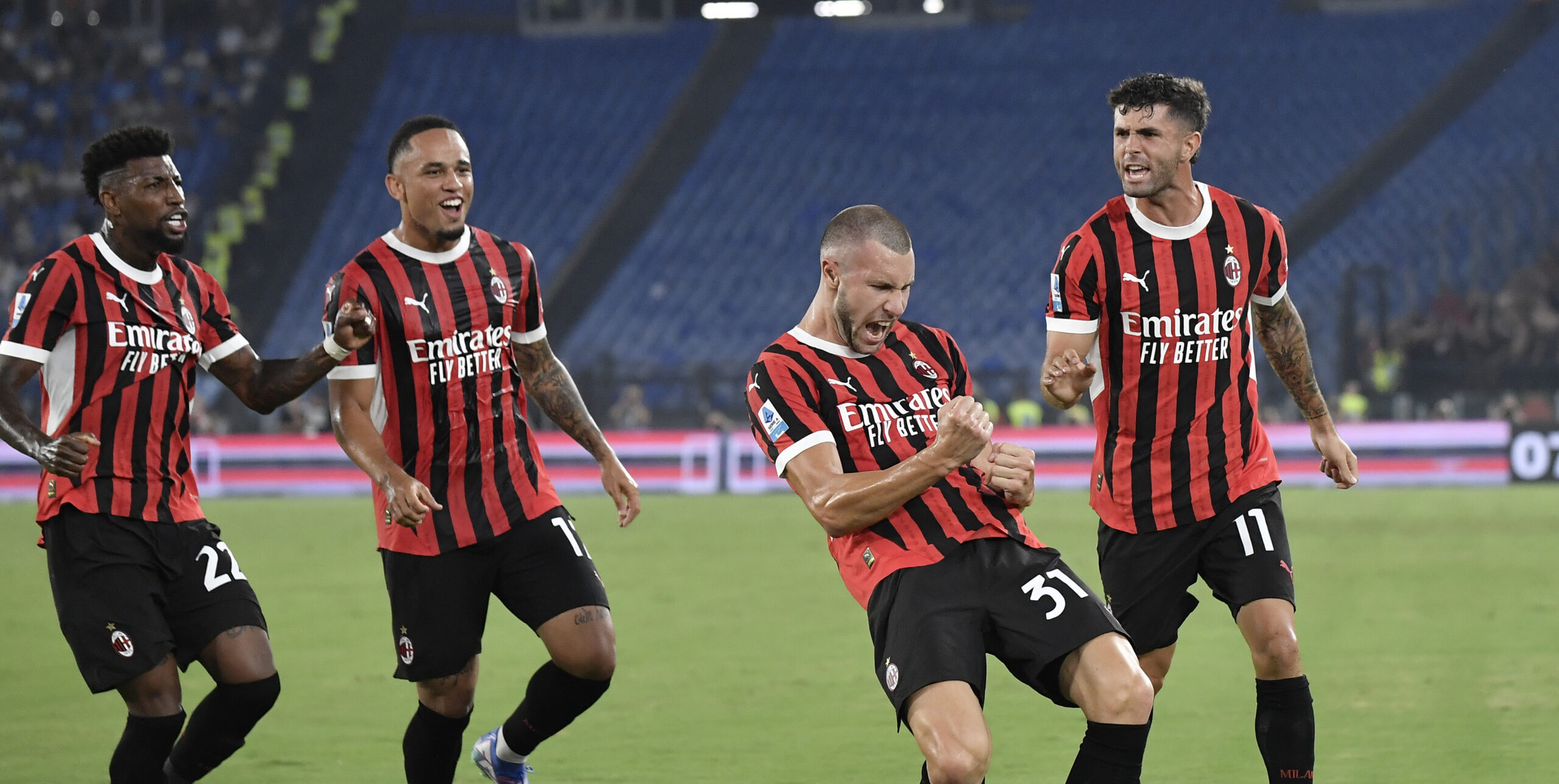 Strahinja Pavlovic of AC Milan celebrates with Emerson Royal, Noah Okafor and Christian Pulisic after scoring the goal of 0-1 during the Serie A football match between SS Lazio and AC Milan at Olimpico stadium in Rome (Italy), August 31, 2024./Sipa USA *** No Sales in France and Italy ***
2024.08.31 Rzym
pilka nozna liga wloska
SS Lazio Rzym - AC Milan
Foto Antonietta Baldassarre/Insidefoto/SIPA USA/PressFocus

!!! POLAND ONLY !!!