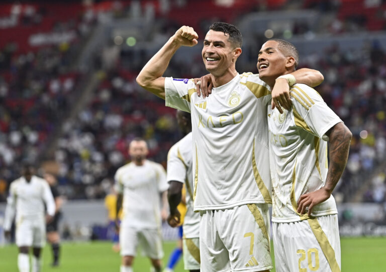 (241126) -- AL KHOR, Nov. 26, 2024 (Xinhua) -- Cristiano Ronaldo (L) of Al Nassr FC celebrates after scoring opening goal during the AFC Champions League elite football match between Qatar&#039;s Al Gharafa SC and Saudi Arabia&#039;s Al Nassr FC at Al-Bayt Stadium in Al Khor, Qatar, on Nov. 25, 2024. (Photo by Nikku/Xinhua)

2024.11.25 Al Khor
pilka nozna azjatycka liga mistrzow
Al Gharafa SC - Al Nassr FC
Foto Nikku/Xinhua/PressFocus

!!! POLAND ONLY !!!