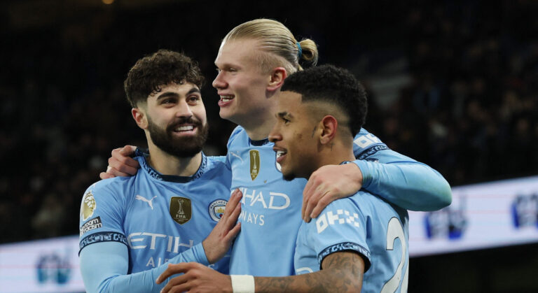 Soccer Football - Premier League - Manchester City v West Ham United - Etihad Stadium, Manchester, Britain - January 4, 2025 Manchester City&#039;s Erling Haaland celebrates scoring their third goal with Savinho and Josko Gvardiol  EDITORIAL USE ONLY. NO USE WITH UNAUTHORIZED AUDIO, VIDEO, DATA, FIXTURE LISTS, CLUB/LEAGUE LOGOS OR &#039;LIVE&#039; SERVICES. ONLINE IN-MATCH USE LIMITED TO 120 IMAGES, NO VIDEO EMULATION. NO USE IN BETTING, GAMES OR SINGLE CLUB/LEAGUE/PLAYER PUBLICATIONS. PLEASE CONTACT YOUR ACCOUNT REPRESENTATIVE FOR FURTHER DETAILS..,Image: 951753362, License: Rights-managed, Restrictions: NO USE WITH UNAUTHORIZED AUDIO, VIDEO, DATA, FIXTURE LISTS, CLUB/LEAGUE LOGOS OR “LIVE” SERVICES. ONLINE IN-MATCH USE LIMITED TO 45 IMAGES, NO VIDEO EMULATION. NO USE IN BETTING, GAMES OR SINGLE CLUB/LEAGUE/PLAYER PUBLICATIONS., Model Release: no, Credit line: Phil Noble / Reuters / Forum
