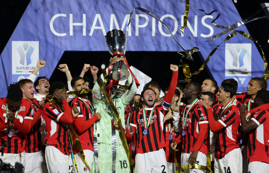 Soccer Football - Italian Super Cup - Final - Inter Milan v AC Milan - Al Awwal Park, Riyadh, Saudi Arabia - January 7, 2025 AC Milan&#039;s Mike Maignan lifts the trophy as he celebrates with teammates after winning the Italian Super Cup,Image: 952137671, License: Rights-managed, Restrictions: , Model Release: no, Credit line: Claudia Greco / Reuters / Forum