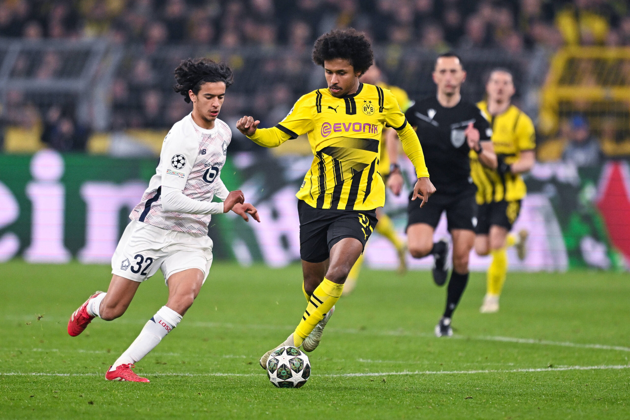 04.03.2025, Fussball UEFA Champions League 2024/2025, Achtelfinale, Borussia Dortmund - Lille OSC, im Signal-Iduna-Park, Ayyoub Bouaddi OSC Lille, Karim Adeyemi Borussia Dortmund, ***DFL and DFB regulations prohibit any use of photographs as image sequences and/or quasi-video.*** *** 04 03 2025, Football UEFA Champions League 2024 2025, Round of 16, Borussia Dortmund Lille OSC, at Signal Iduna Park, Ayyoub Bouaddi OSC Lille , Karim Adeyemi Borussia Dortmund , DFL and DFB regulations prohibit any use of photographs as image sequences and or quasi video
2025.03.05 Dortmund
pilka nozna , liga mistrzow
Borussia Dortmund - Lille OSC
Foto IMAGO/PressFocus

!!! POLAND ONLY !!!