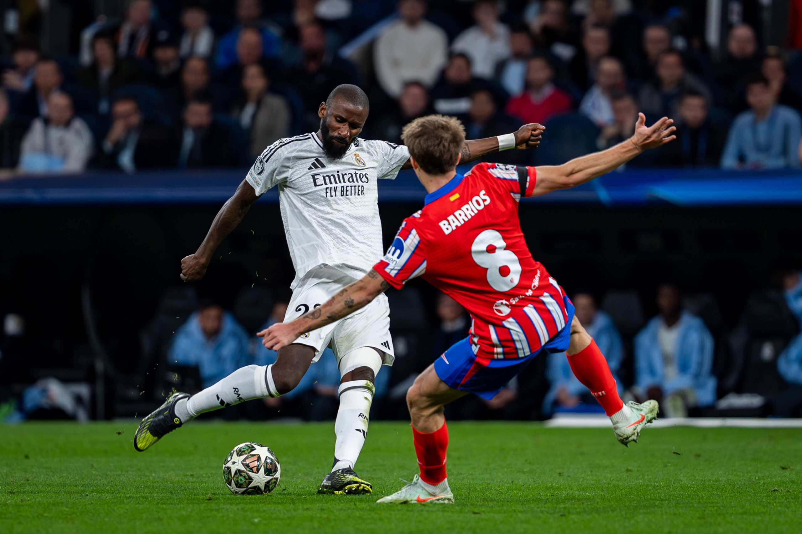 Real Madrid CF vs Atletico de Madrid - UEFA Champions League 2024/25 Round of 16 First Leg Antonio Rudiger of Real Madrid CF L is in action with the ball defended by Pablo Barrios of Atletico de Madrid R during the UEFA Champions League 2024/25 Round of 16 first leg match between Real Madrid C.F. and Atletico de Madrid at Estadio Santiago Bernabeu on March 4, 2025 in Madrid, Spain. Madrid Estadio Santiago Bernabeu Madrid Spain Copyright: xAlbertoxGardinx AGardin_20250304_Football_Champions_Real_Madrid_Atletico_Madrid_0580
2025.03.04 Madryt
pilka nozna , liga mistrzow
Real Madryt - Atletico Madryt
Foto IMAGO/PressFocus

!!! POLAND ONLY !!!