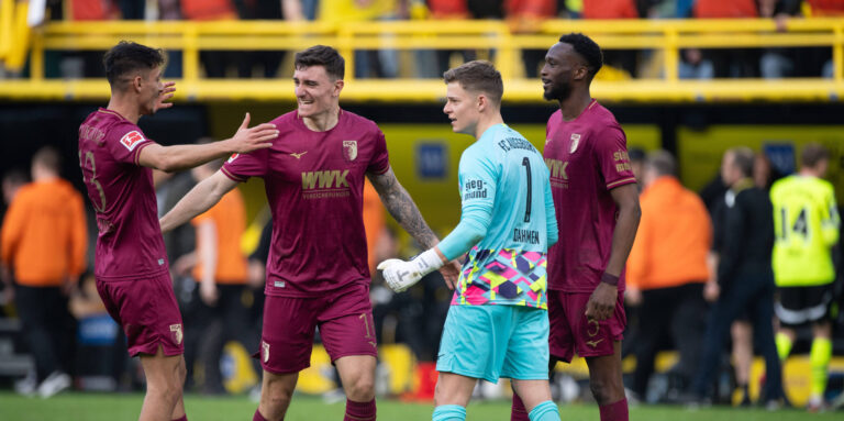 Schlussjubel FC Augsburg, Jubel, jubeln, Freude, cheers, v.l. Dimitrios GIANNOULIS A, Cedric ZEISIGER A, Torwart Finn DAHMEN A, Chrislain MATSIMA A Fussball 1. Bundesliga, 25. Spieltag, Borussia Dortmund DO - FC Augsburg A 0-1 am 08.03.2025 in Dortmund/ Deutschland. DFL regulations prohibit any use of photographs as image sequences and/or quasi-video  *** Final cheer FC Augsburg, cheer, jubilation, joy, cheers, v l Dimitrios GIANNOULIS A , Cedric ZEISIGER A , goalkeeper Finn DAHMEN A , Chrislain MATSIMA A Football 1 Bundesliga, 25 Matchday, Borussia Dortmund DO FC Augsburg A 0 1 on 08 03 2025 in Dortmund Germany DFL regulations prohibit any use of photographs as image sequences and or quasi video 
2025.03.08 Dortmund
pilka nozna , liga niemiecka
Borussia Dortmund - FC Augsburg
Foto IMAGO/PressFocus

!!! POLAND ONLY !!!