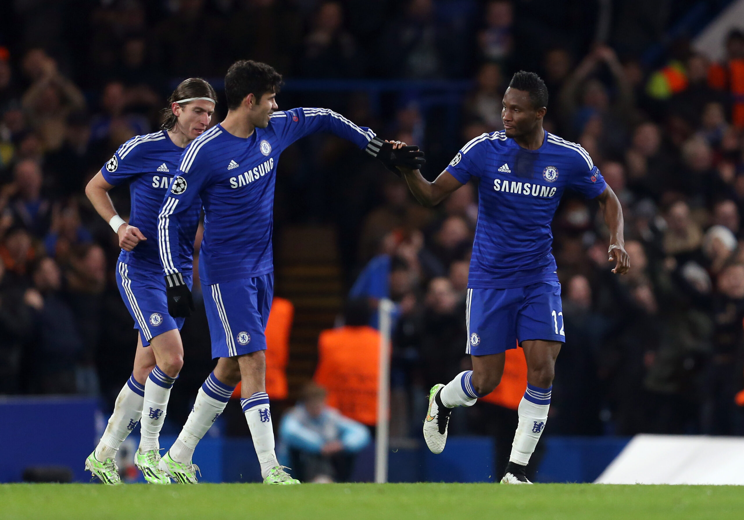 Mikel John Obi of Chelsea celebrates after scoring to make it 3-1 with Diego Costa of Chelsea
10.12.2014 Londyn
PILKA NOZNA
UEFA Liga Mistrzow 
Chelsea - Sporting Lizbona
FOTO Catherine Ivill / AMA / PRESSFOCUS

POLAND ONLY!!