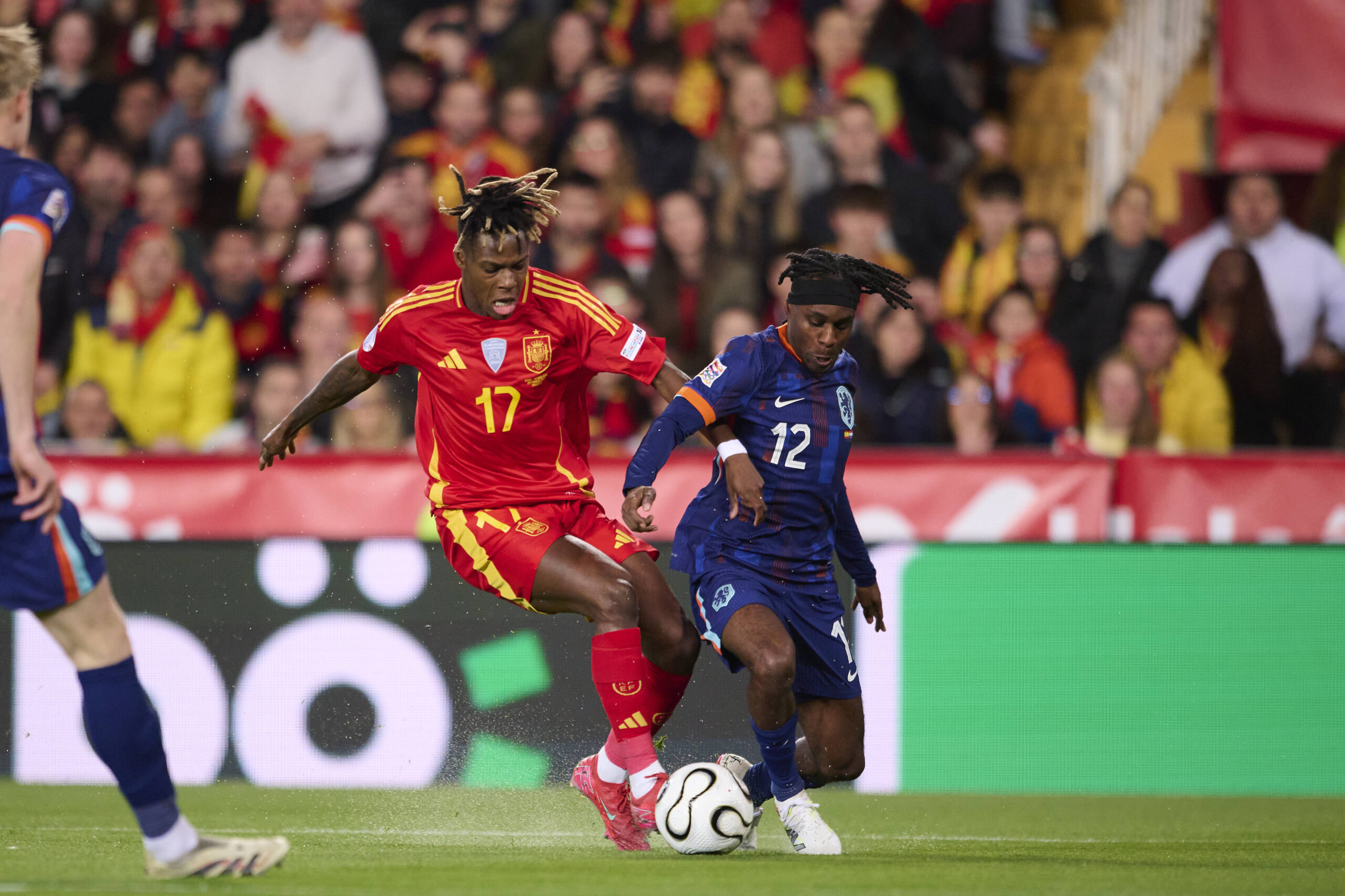 Spain v Netherlands - UEFA Nations League Quarterfinal Leg Two VALENCIA, SPAIN - MARCH 23: Nico Williams of Spain competes for the ball with Jeremie Frimpong of Netherlands during the UEFA Nations League quarterfinal leg two match between Spain and Netherlands at Mestalla Stadium on March 23, 2025 in Valencia, Spain. Photo by Francisco Macia/Photo Players Images/Magara Press Valencia Mestalla Stadium Spain Copyright: xFranciscoxMaciax
2025.03.23 Walencja
pilka nozna , Liga Narodow UEFA
Hiszpania - Holandia
Foto IMAGO/PressFocus

!!! POLAND ONLY !!!