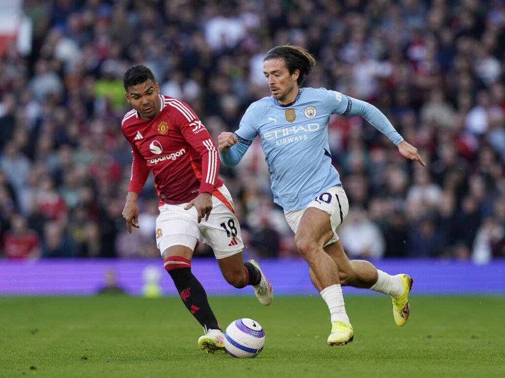 Manchester, England, 6th April 2025. Jack Grealish of Manchester City brought down by Casemiro of Manchester United, ManU during the Manchester United vs Manchester City Premier League match at Old Trafford, Manchester. Picture credit should read: Andrew Yates / Sportimage EDITORIAL USE ONLY. No use with unauthorised audio, video, data, fixture lists, club/league logos or live services. Online in-match use limited to 120 images, no video emulation. No use in betting, games or single club/league/player publications. SPI_046_AY_United_City SPI-3814-0047
2025.04.06 Manchester
pilka nozna , liga angielska
Manchester United - Manchester City
Foto IMAGO/PressFocus

!!! POLAND ONLY !!!