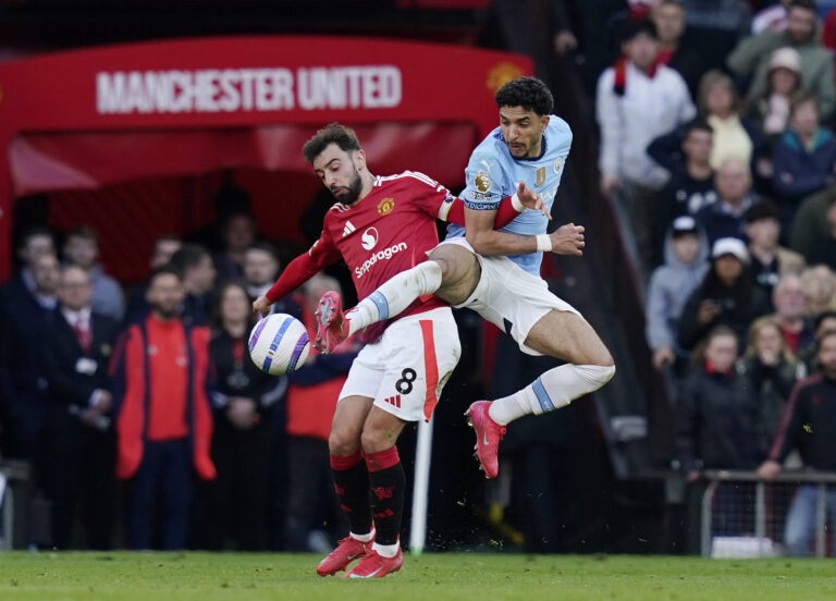 Manchester, England, 6th April 2025. Bruno Fernandes of Manchester United, ManU tackled by Omar Marmoush of Manchester City during the Manchester United vs Manchester City Premier League match at Old Trafford, Manchester. Picture credit should read: Andrew Yates / Sportimage EDITORIAL USE ONLY. No use with unauthorised audio, video, data, fixture lists, club/league logos or live services. Online in-match use limited to 120 images, no video emulation. No use in betting, games or single club/league/player publications. SPI_051_AY_United_City SPI-3814-0052
2025.04.06 Manchester
pilka nozna , liga angielska
Manchester United - Manchester City
Foto IMAGO/PressFocus

!!! POLAND ONLY !!!