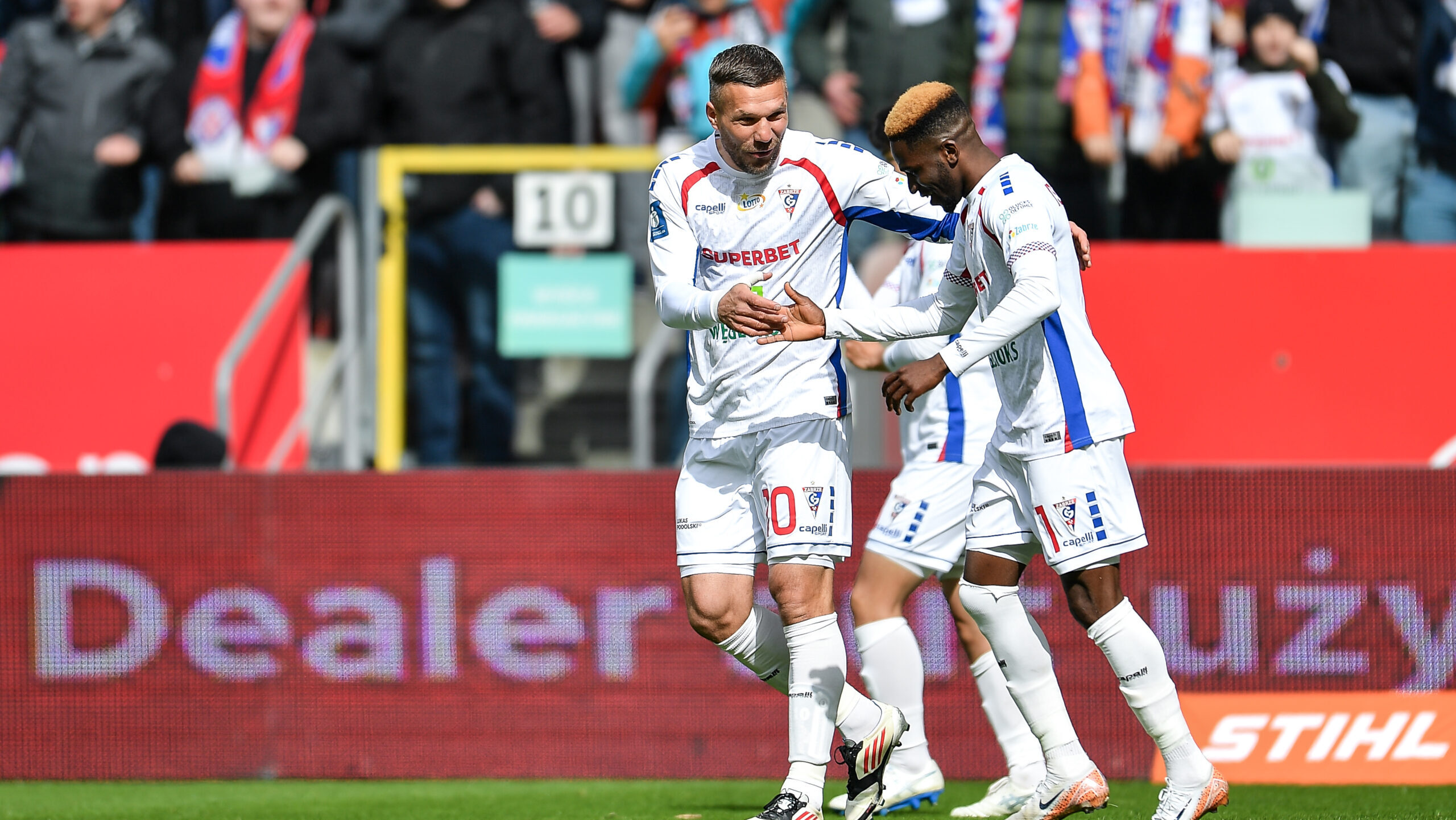 2025.04.06 Zabrze
Pilka nozna PKO Ekstraklasa sezon 2024/2025
Gornik Zabrze - Legia Warszawa
N/z Lukas Podolski Taofeek Ismaheel radosc gol
Foto Mateusz Sobczak / PressFocus

2025.04.06 Zabrze
Football Polish League PKO Ekstraklasa season 2024/2025
Gornik Zabrze - Legia Warszawa
Lukas Podolski Taofeek Ismaheel radosc gol
Credit: Mateusz Sobczak / PressFocus