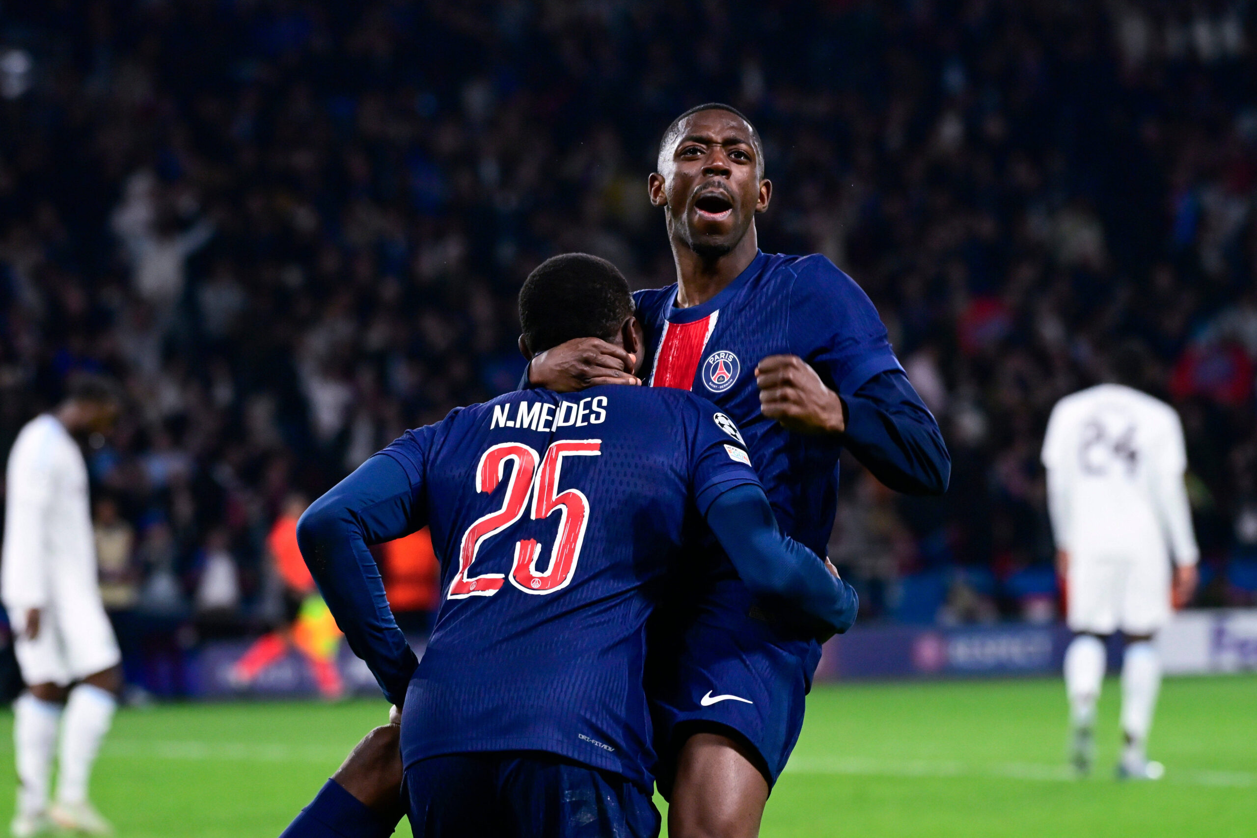 TAVARES Nuno MENDES ( 25 - PSG ) celebrates with Ousmane DEMBELE ( 10 - PSG ) during the UEFA Champions League match between Paris Saint Germain and Aston Villa FC at Parc Des Princes on April 09 , 2025 in Paris, France. ( Photo by Dante Badano / PsnewZ ) - - Photo :  Dante Badano / Dante Badano / PsnewZ / SIPA /00307287_0078//Credit:PSNEWZ/SIPA/2504092311
2025.04.09 Paryz
pilka nozna liga mistrzow
PSG - Aston Villa
Foto PSNEWZ/SIPA/PressFocus

!!! POLAND ONLY !!!