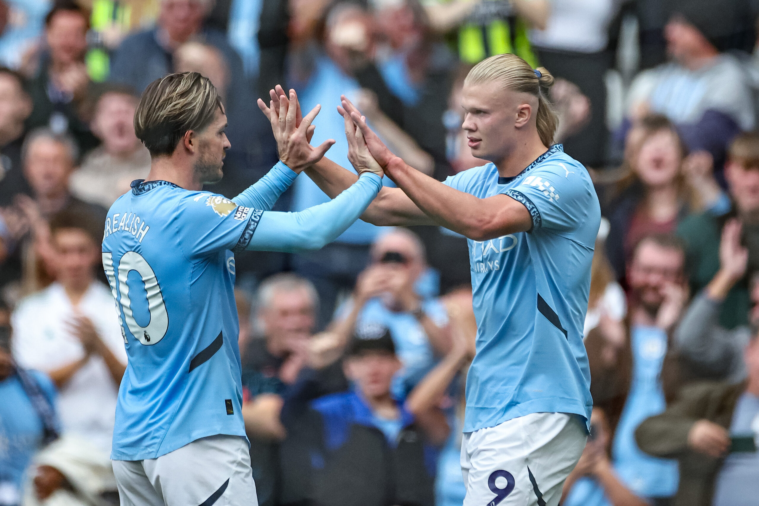 Erling Haaland of Manchester City celebrates his goal to make it 2-1 with Jack Grealish of Manchester City during the Premier League match Manchester City vs Brentford at Etihad Stadium, Manchester, United Kingdom, 14th September 2024

(Photo by Mark Cosgrove/News Images) in Manchester, United Kingdom on 9/14/2024. (Photo by Mark Cosgrove/News Images/Sipa USA)
2024.09.14 Manchester
pilka nozna liga angielska
Premier League Manchester City - Brentford
Foto News Images/SIPA USA/PressFocus

!!! POLAND ONLY !!!