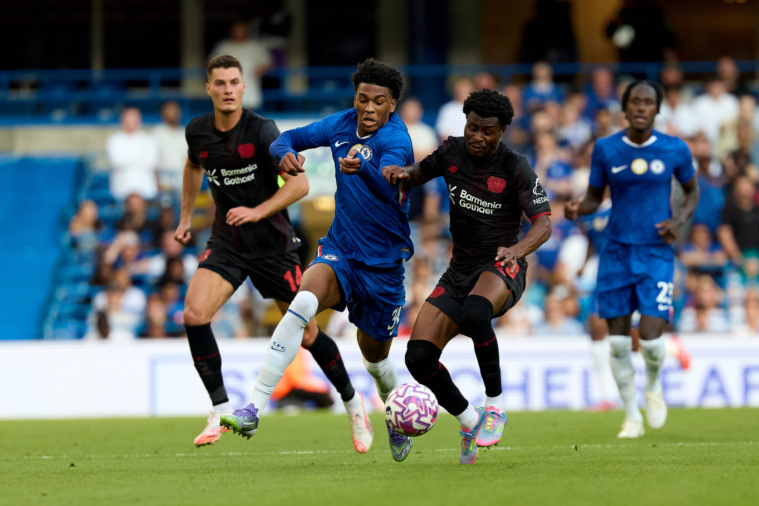 Josh Acheampong left of Chelsea and Nathan Tella of Bayer Leverkusen vie for the ball during the VisitMalta weekender soccer match between Chelsea FC and Bayer 04 Leverkusen, at Stamford Bridge, London, United Kingdom on 08 August 2025. VisitMalta Weekender - Chelsea FC v Bayer 04 Leverkusen
2025.08.08 Londyn
pilka nozna sparing mecz towarzyski
Chelsea Londyn - Bayer 04 Leverkusen
Foto IMAGO/PressFocus

!!! POLAND ONLY !!!
