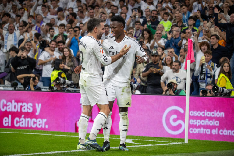 Real Madrid&#039;s Captain, Dani Carvajal (L) greets Real Madrid&#039;s Brazilian forward Vinicius Jr. (R) as they celebrate a goal this afternoon at the Santiago Bernabeu Stadium. Real Madrid defeated Villarreal by 2 goals to 0 in the 9th round of the League at the Santiago Bernabu stadium in Madrid. (Photo by David Canales / SOPA Images/Sipa USA)
2024.10.05 Madryt
pilka nozna , liga hiszpanska
Real Madryt - Villarreal CF
Foto David Canales/SOPA Images/SIPA USA/PressFocus

!!! POLAND ONLY !!!