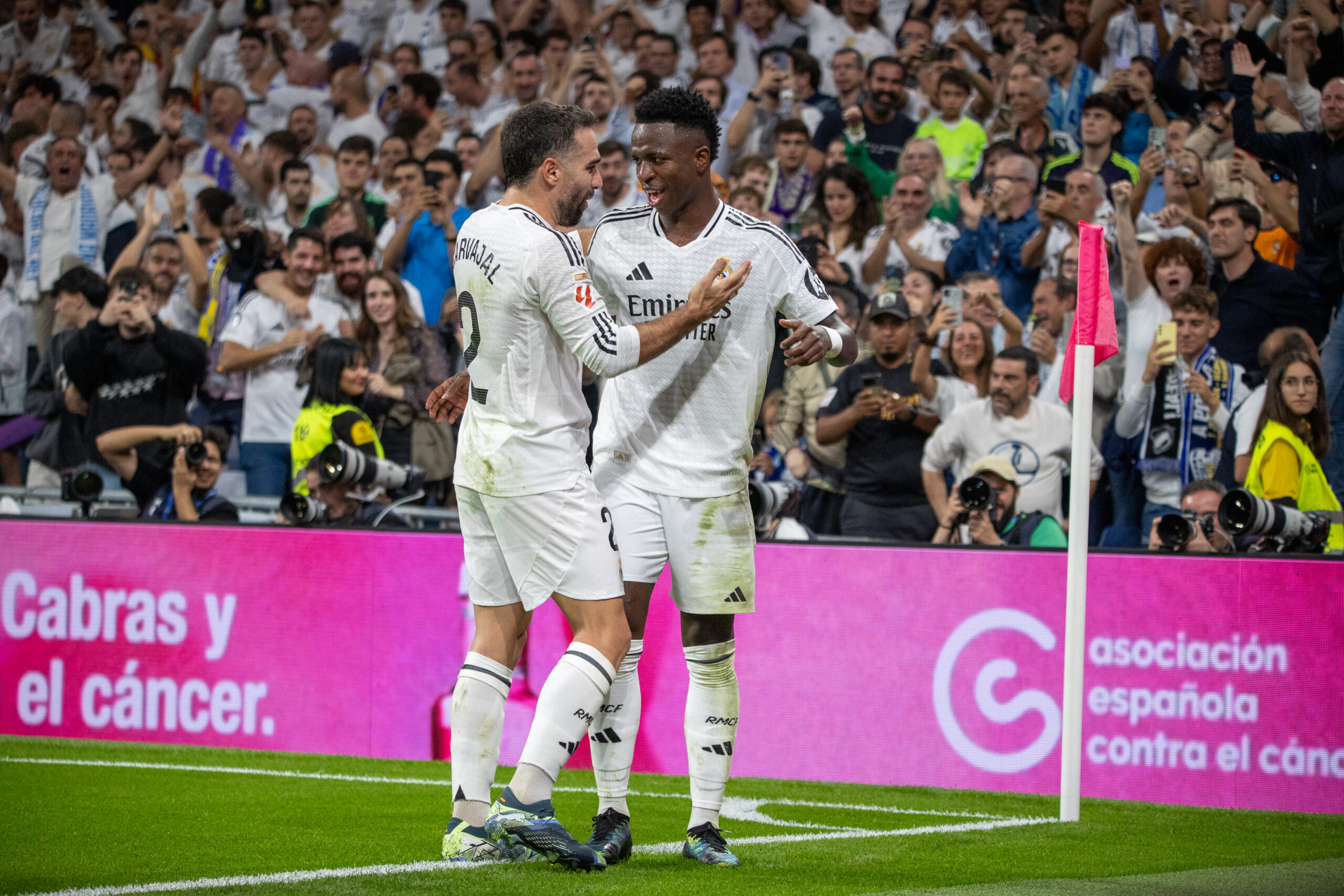 Real Madrid&#039;s Captain, Dani Carvajal (L) greets Real Madrid&#039;s Brazilian forward Vinicius Jr. (R) as they celebrate a goal this afternoon at the Santiago Bernabeu Stadium. Real Madrid defeated Villarreal by 2 goals to 0 in the 9th round of the League at the Santiago Bernabu stadium in Madrid. (Photo by David Canales / SOPA Images/Sipa USA)
2024.10.05 Madryt
pilka nozna , liga hiszpanska
Real Madryt - Villarreal CF
Foto David Canales/SOPA Images/SIPA USA/PressFocus

!!! POLAND ONLY !!!