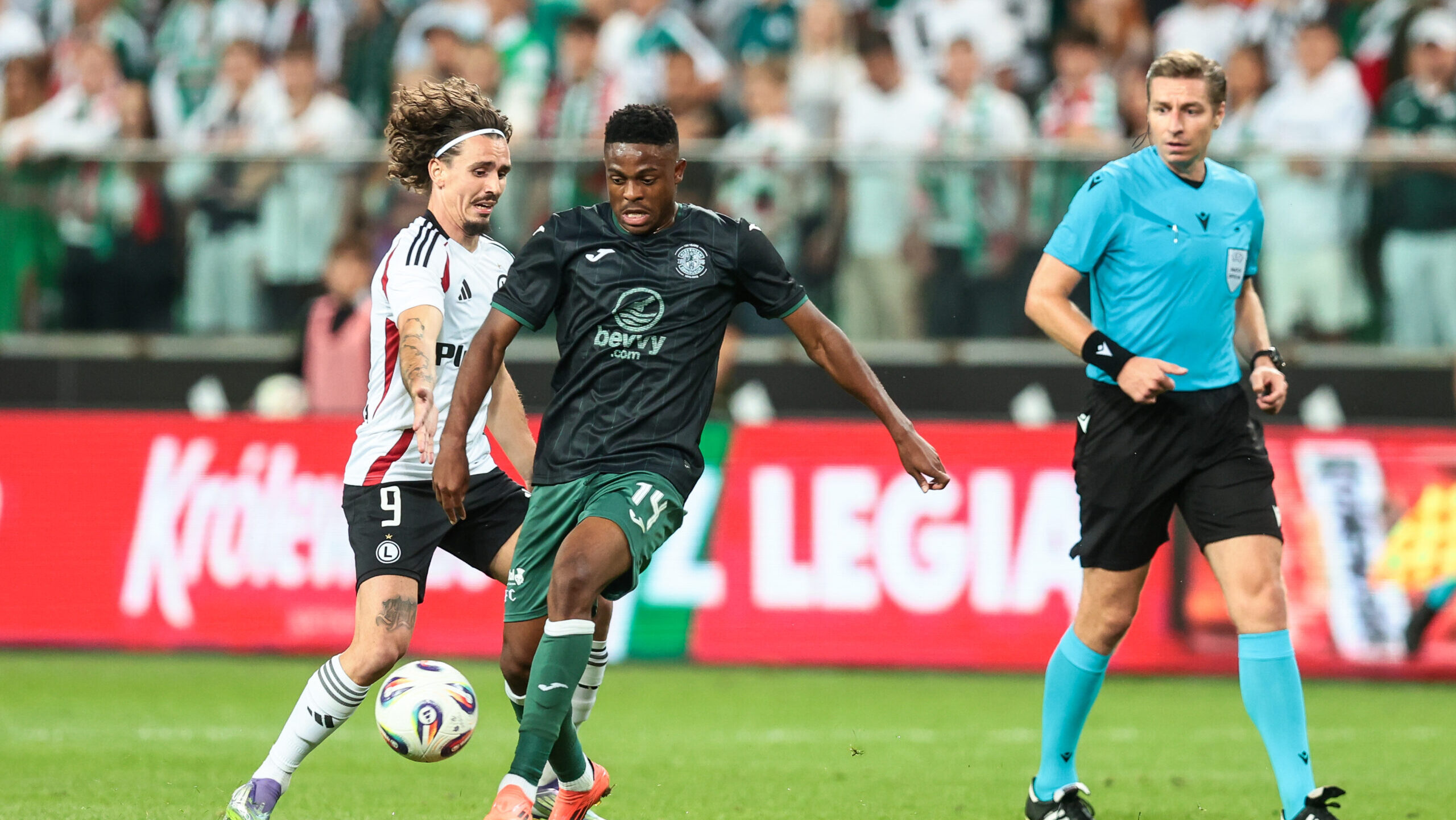 2025.08.28 Warszawa pilka nozna Liga Konferencji kwalifikacje sezon 2025/2026
Legia Warszawa - Hibernian FC
N/z Migouel Alfarela (Legia), Miguel Chaiwa (Hibernian)
Foto Tomasz Jastrzebowski / Foto Olimpik / PressFocus

2025.08.28 Warszawa Football - UEFA Conference League play off round season 2025/2026
Legia Warszawa - Hibernian FC
Migouel Alfarela (Legia), Miguel Chaiwa (Hibernian)
Credit: Tomasz Jastrzebowski / Foto Olimpik / PressFocus