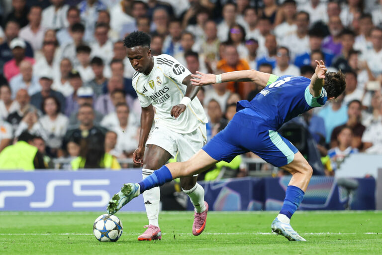 Vinicius Junior of Real Madrid CF and Leonardo Balerdi of Olympique de Marseille during the UEFA Champions League, League phase, Matchday 1 football match between Real Madrid CF and Olympique de Marseille on 16 September 2025 at Santiago Bernabeu stadium in Madrid, Spain (Photo by /Sipa USA)
2025.09.17 Madryt
pilka nozna liga mistrzow
Real Madryt - Olympique Marsylia
Foto IPA/SIPA USA/PressFocus

!!! POLAND ONLY !!!