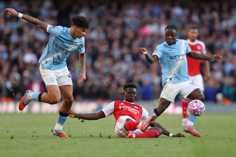 London, England, 21st September 2025. Nico OReilly of Manchester City tackles Bukayo Saka of Arsenal during the Arsenal vs Manchester City Premier League match at the Emirates Stadium, London. Picture credit should read: David Klein / Sportimage EDITORIAL USE ONLY. No use with unauthorised audio, video, data, fixture lists, club/league logos or live services. Online in-match use limited to 120 images, no video emulation. No use in betting, games or single club/league/player publications. SPI_052_DK_Arsenal_Man_City SPI-4152-0047
2025.09.21 Londyn
pilka nozna , liga angielska
Arsenal Londyn - Manchester City
Foto IMAGO/PressFocus

!!! POLAND ONLY !!!