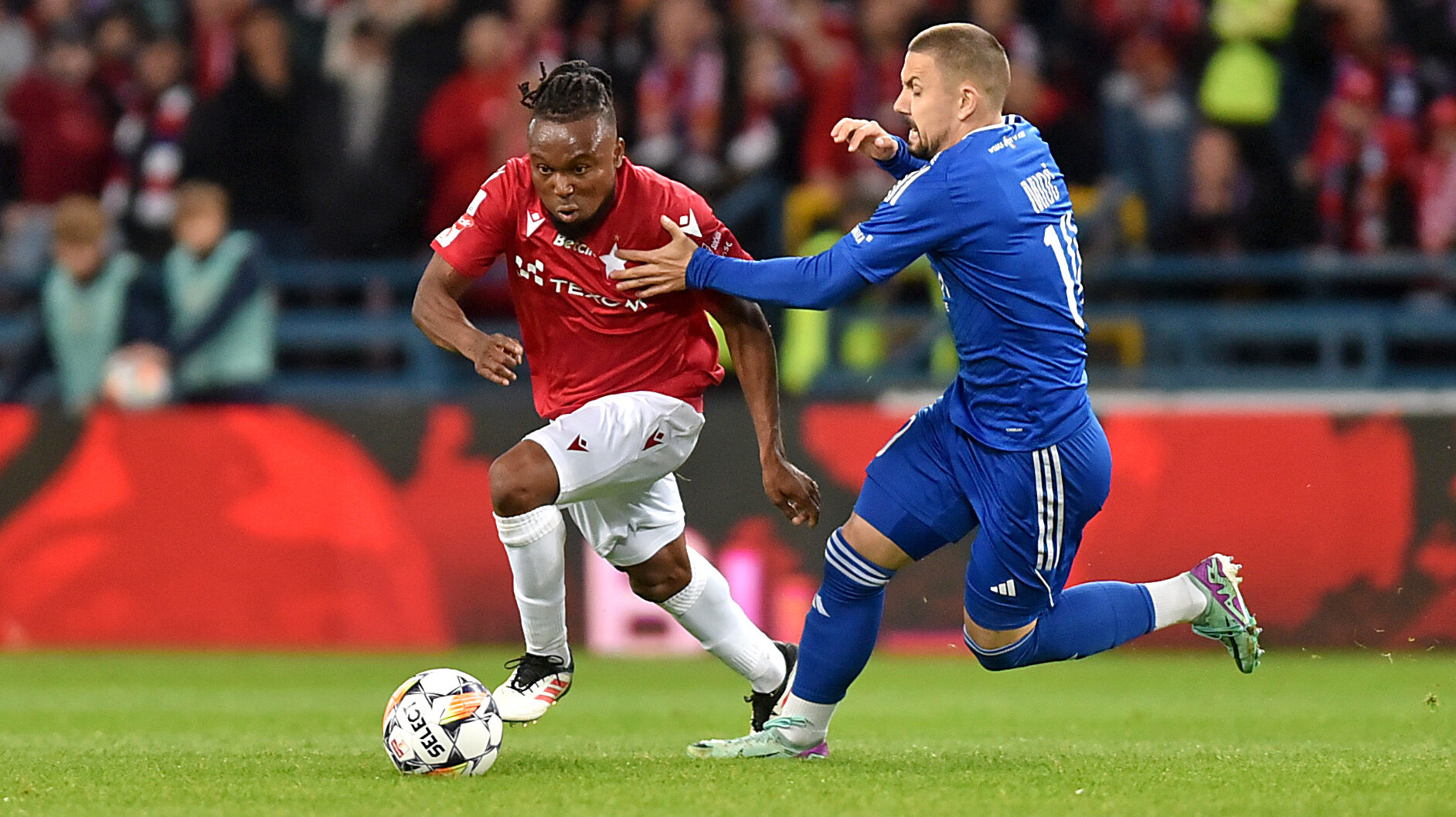 2025.05.29 Krakow
Pilka nozna , Betclic I liga , sezon 2024/25 , baraze o Ekstraklase , polfinal
Wisla Krakow - Miedz Legnica
N/z James Igbekeme, Benedik Mioc
Foto Krzysztof Porebski / PressFocus

2025.05.29 Krakow
Football , Polish league, second level , 2024/2025 season , promotion play off , semi final
Wisla Krakow - Miedz Legnica
James Igbekeme, Benedik Mioc
Credit: Krzysztof Porebski / PressFocus