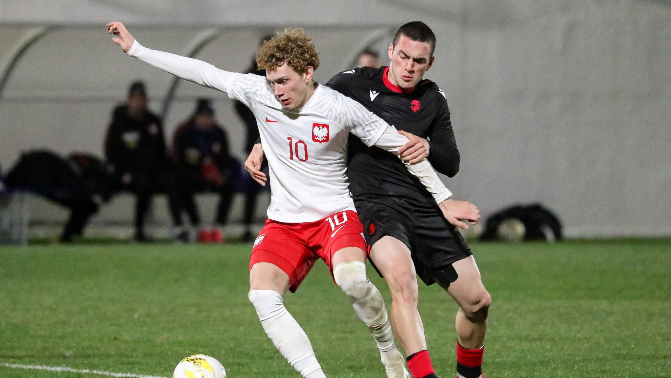 Daniel Mikolajewski of Poland competes for the ball with Tsotne Berelidze of Georgia during the UEFA European Under-19 Championship qualifying match between Poland and Georgia at the M. Meskhi II Stadium on March 19, 2025 in Tbilisi, Georgia. Tbilisi    Ilia Chavchavadze Avenue, Zemo Vake, Vake, Vake District, Tbilisi, 1062, Georgia Georgia Copyright: xArturxStabulnieksx A86I5362
2025.03.19 Tbilisi
pilka nozna Eliminacje , Kwalifikacje do Mistrzostw Europy U-19
Gruzja - Polska
Foto IMAGO/PressFocus

!!! POLAND ONLY !!!